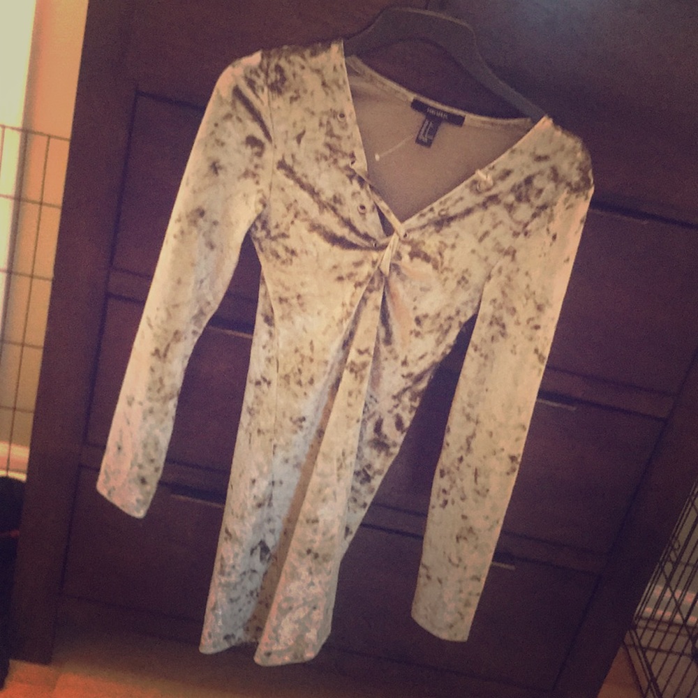 Long sleeve green blouse.